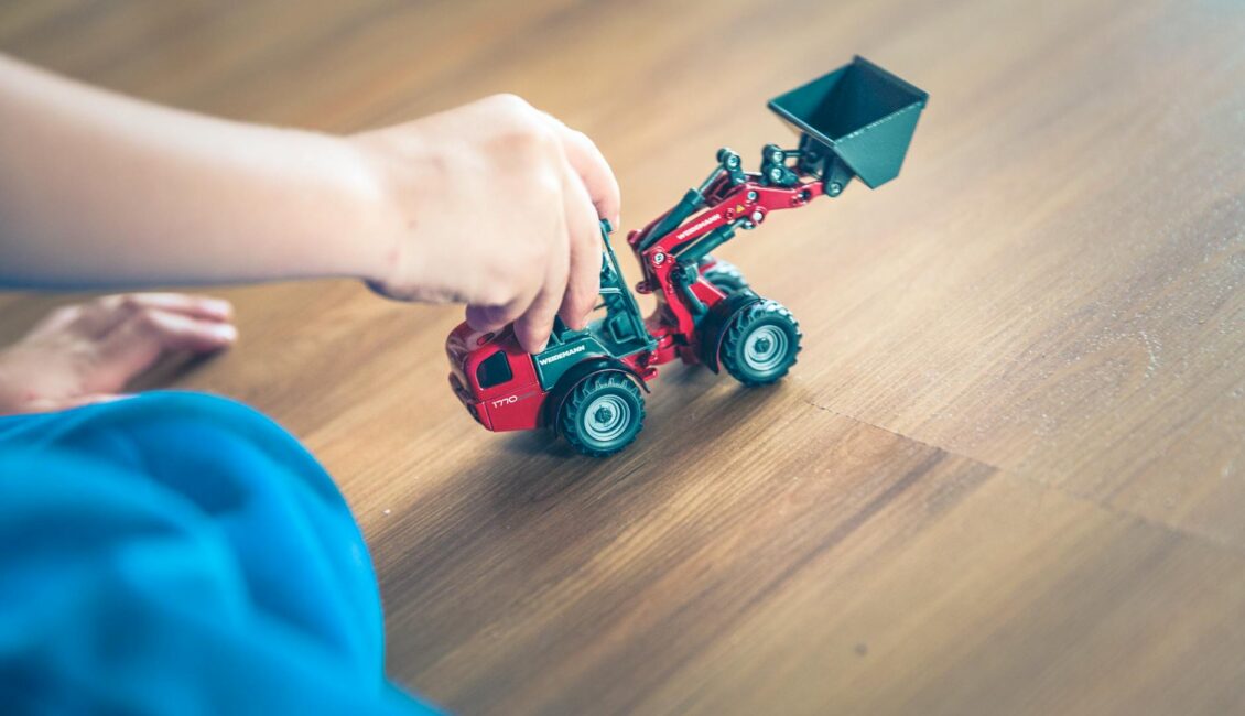 red and black plastic toy car