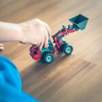 red and black plastic toy car