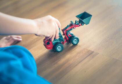 red and black plastic toy car