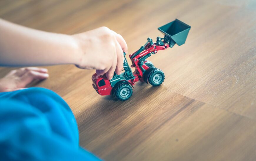 red and black plastic toy car