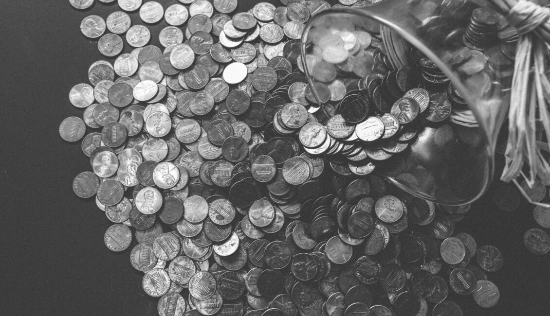 grayscale photo of coins