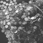 grayscale photo of coins