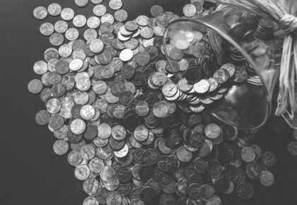 grayscale photo of coins