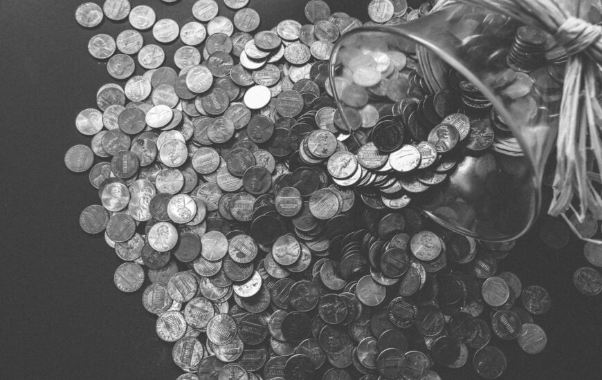 grayscale photo of coins