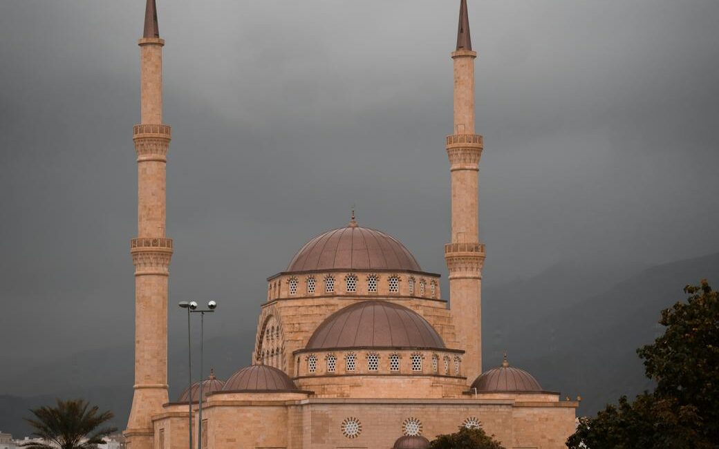 a brown concrete mosque building